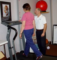 Picture showing a Physiotherapist and a patient during exercise