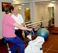 Picture showing a Physiotherapist and a patient during exercise